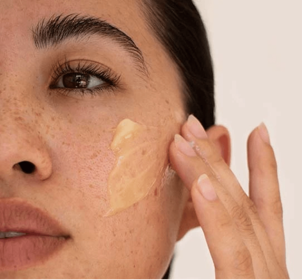 Women applying balm for seborrheic dermatitis 
